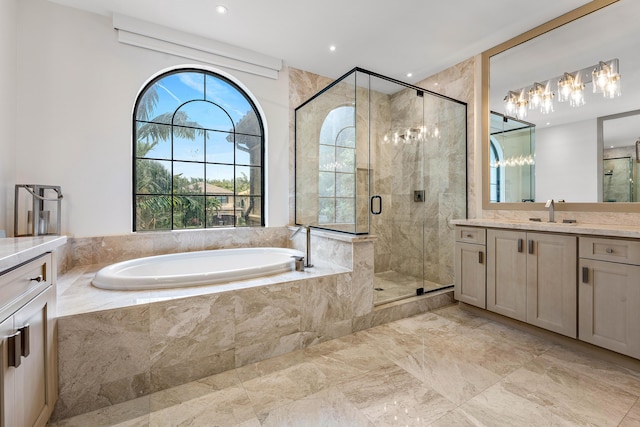 16491 Gateway Bridge Dr, Delray Beach, FL 33446 - bathroom featuring vanity, a garden tub, a stall shower, a chandelier, and marble finish flooring