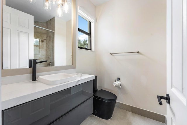 16491 Gateway Bridge Dr, Delray Beach, FL 33446 - full bath with toilet, vanity, a tile shower, baseboards, and a chandelier