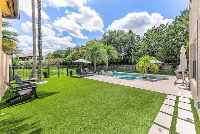 16491 Gateway Bridge Dr, Delray Beach, FL 33446 - view of yard featuring a patio area and a pool with connected hot tub
