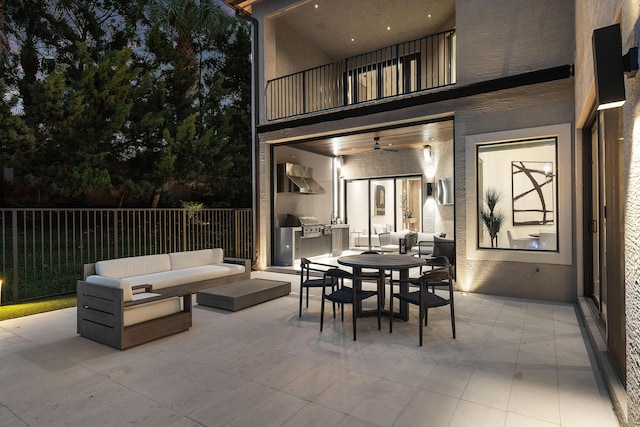 16491 Gateway Bridge Dr, Delray Beach, FL 33446 - view of patio with a balcony, an outdoor kitchen, an outdoor hangout area, and outdoor dining space