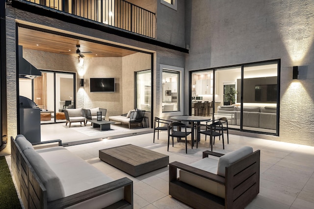 16491 Gateway Bridge Dr, Delray Beach, FL 33446 - view of patio with an outdoor hangout area, outdoor dining space, a ceiling fan, and a balcony