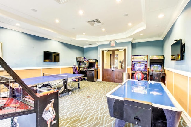 16491 Gateway Bridge Dr, Delray Beach, FL 33446 - recreation room featuring a tray ceiling, ornamental molding, a wainscoted wall, carpet, and recessed lighting