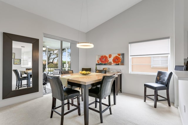 9927 Seacrest Cir Unit 202, Boynton Beach, FL 33437 - dining space featuring light colored carpet and lofted ceiling