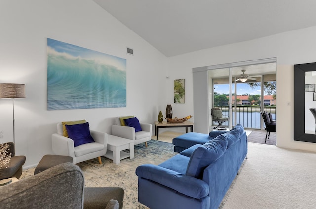 9927 Seacrest Cir Unit 202, Boynton Beach, FL 33437 - carpeted living room with a water view, a ceiling fan, visible vents, and vaulted ceiling