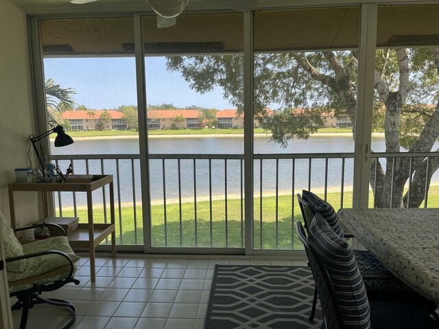 9927 Seacrest Cir Unit 202, Boynton Beach, FL 33437 - sunroom featuring a water view
