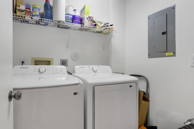 9927 Seacrest Cir Unit 202, Boynton Beach, FL 33437 - clothes washing area featuring laundry area, washing machine and dryer, and electric panel