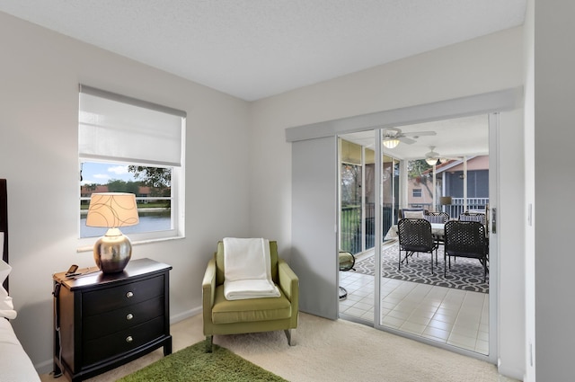 9927 Seacrest Cir Unit 202, Boynton Beach, FL 33437 - bedroom with light colored carpet, a ceiling fan, and visible vents
