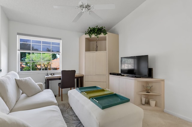 9927 Seacrest Cir Unit 202, Boynton Beach, FL 33437 - living area with a ceiling fan, baseboards, and light carpet