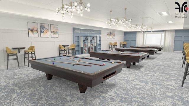9927 Seacrest Cir Unit 202, Boynton Beach, FL 33437 - playroom with billiards, a notable chandelier, carpet flooring, and a decorative wall
