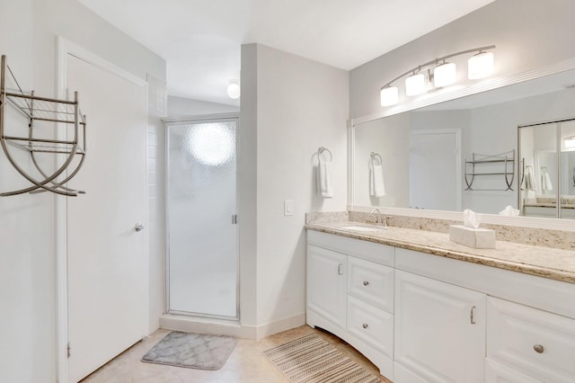 6488 Via Regina, Boca Raton, FL 33433 - bathroom with a stall shower, vanity, baseboards, and tile patterned flooring