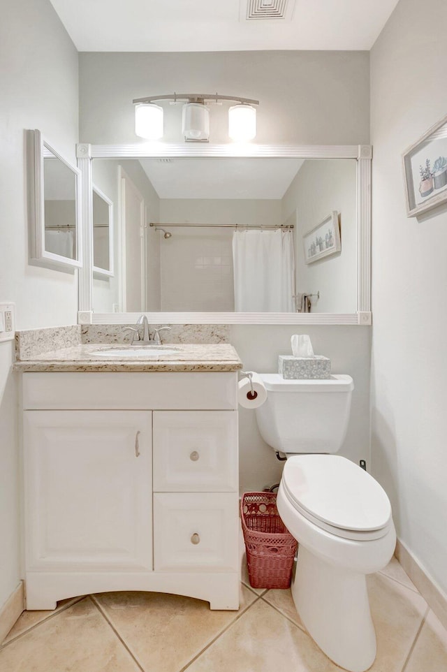 6488 Via Regina, Boca Raton, FL 33433 - full bath with toilet, vanity, baseboards, and tile patterned flooring