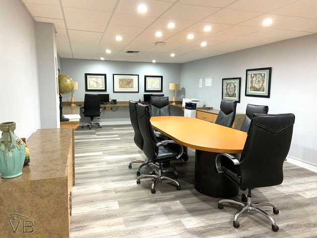office space with recessed lighting, visible vents, and light wood-type flooring