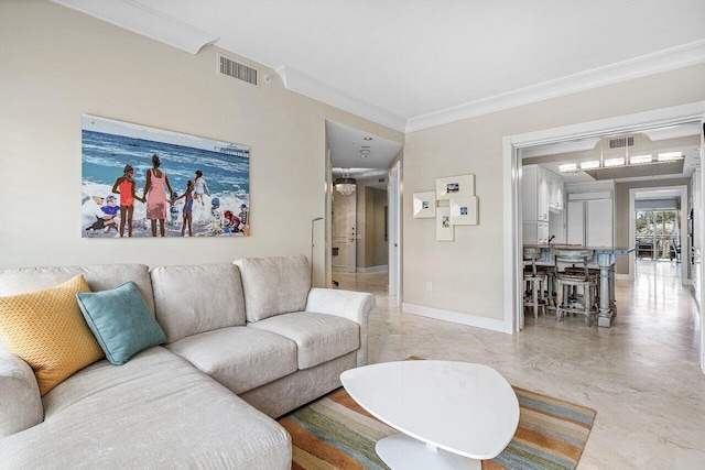 living area with ornamental molding, visible vents, and baseboards