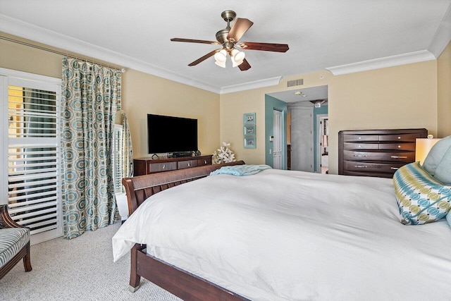 bedroom featuring a ceiling fan, ornamental molding, visible vents, and carpet floors