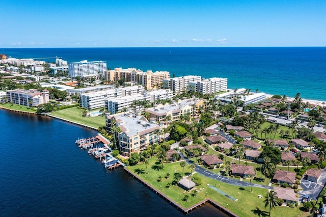 bird's eye view featuring a water view and a view of city