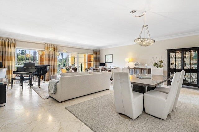 dining space featuring ornamental molding