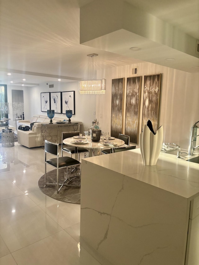 3400 S Ocean Blvd Unit 3H, Highland Beach, FL 33487 - tiled dining space with recessed lighting and a chandelier