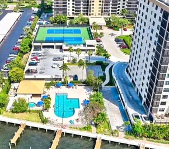 3400 S Ocean Blvd Unit 3H, Highland Beach, FL 33487 - bird's eye view of a pool area and a large body of water