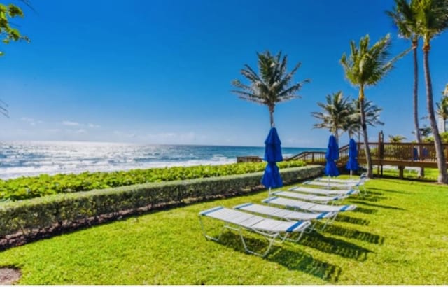 3400 S Ocean Blvd Unit 3H, Highland Beach, FL 33487 - view of green lawn featuring a water view