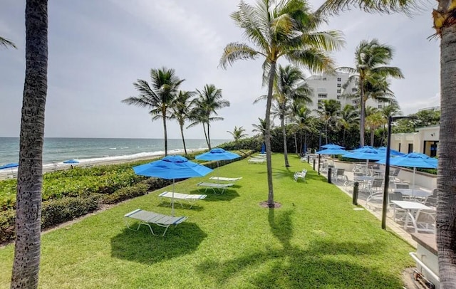 3400 S Ocean Blvd Unit 3H, Highland Beach, FL 33487 - view of community with a lawn and view of water and beach