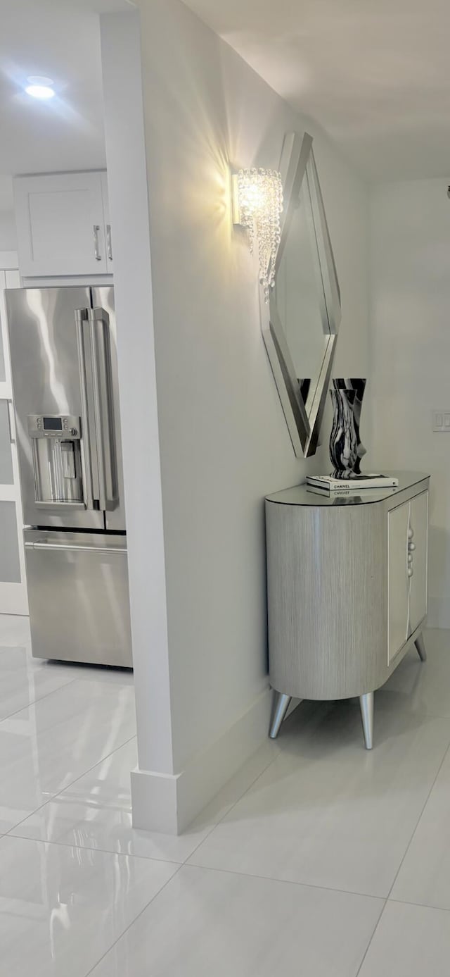 3400 S Ocean Blvd Unit 3H, Highland Beach, FL 33487 - kitchen view of high end refrigerator and white cabinetry