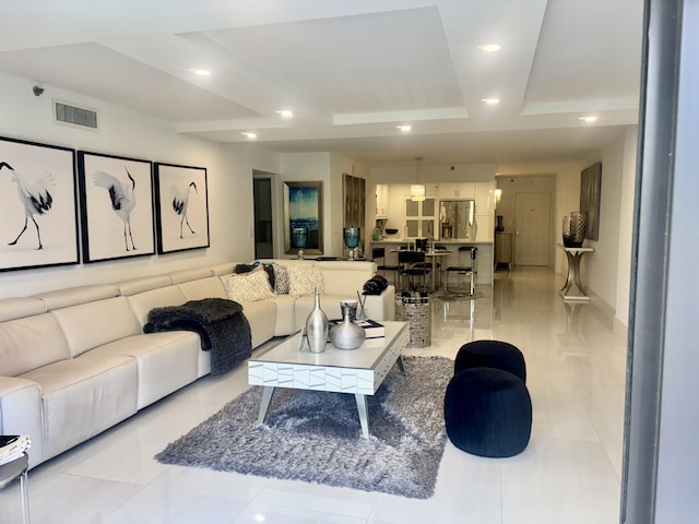 3400 S Ocean Blvd Unit 3H, Highland Beach, FL 33487 - living room with a tray ceiling and recessed lighting