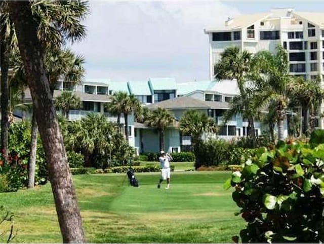 2400 S Ocean Dr Unit 1216, Fort Pierce, FL 34949 - view of community with a yard