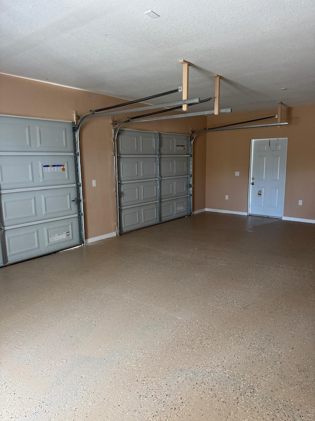 garage with baseboards