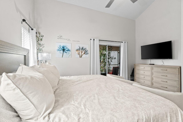 bedroom featuring high vaulted ceiling and ceiling fan