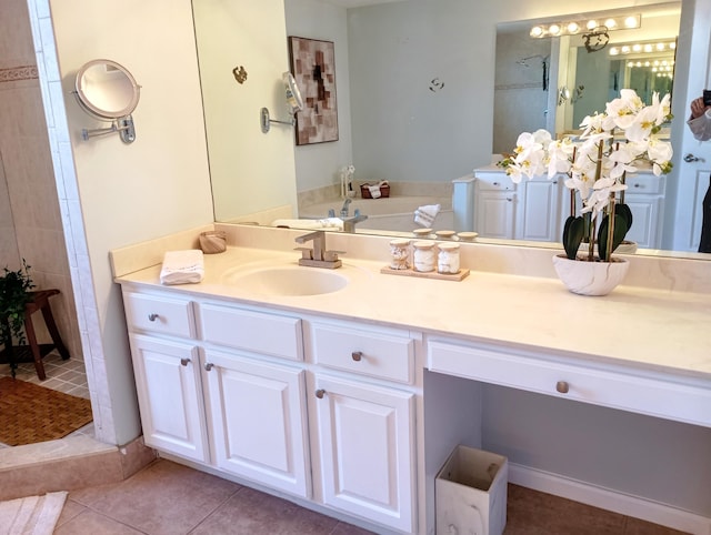 full bathroom featuring vanity, tile patterned floors, a bath, and a stall shower