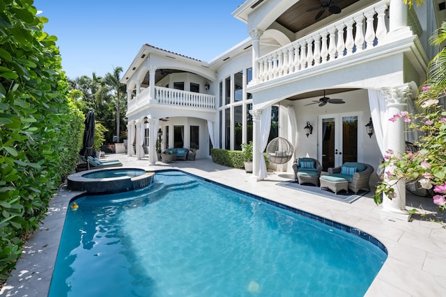 712 NE 71st St, Boca Raton, FL 33487 - rear view of house featuring a patio area, a balcony, ceiling fan, and french doors