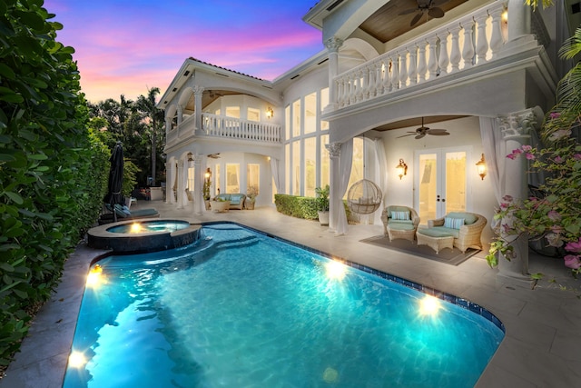 712 NE 71st St, Boca Raton, FL 33487 - back of property featuring a patio, a balcony, ceiling fan, and french doors