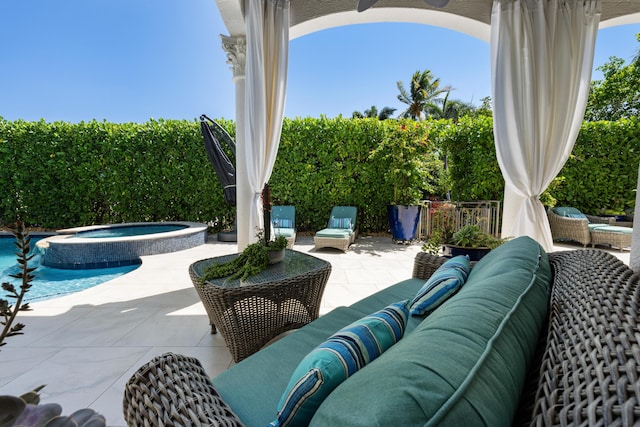 712 NE 71st St, Boca Raton, FL 33487 - view of patio with a pool with connected hot tub and an outdoor living space