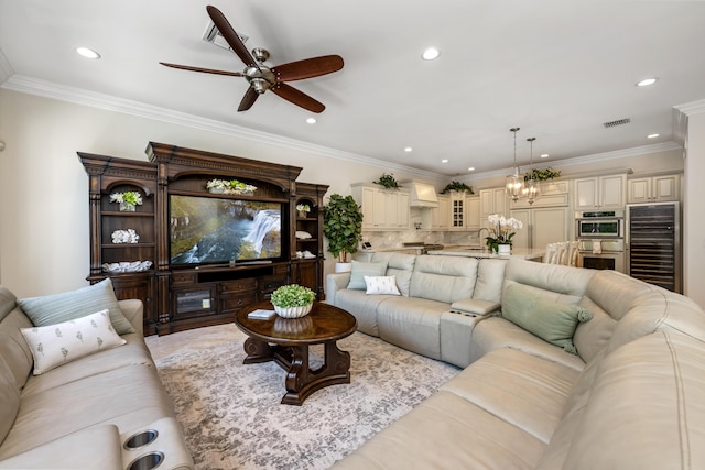 712 NE 71st St, Boca Raton, FL 33487 - living room with recessed lighting, beverage cooler, visible vents, and ceiling fan with notable chandelier