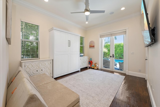 712 NE 71st St, Boca Raton, FL 33487 - entryway with french doors, dark wood finished floors, recessed lighting, a ceiling fan, and ornamental molding