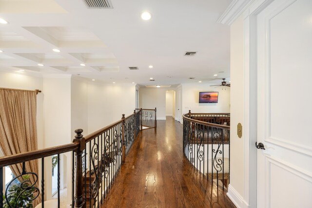712 NE 71st St, Boca Raton, FL 33487 - corridor with visible vents, ornamental molding, an upstairs landing, and wood finished floors