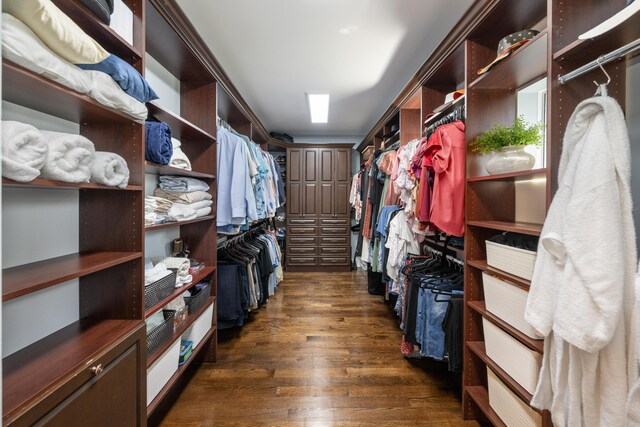 712 NE 71st St, Boca Raton, FL 33487 - spacious closet featuring dark wood finished floors