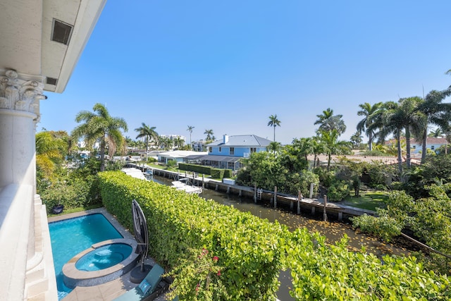 712 NE 71st St, Boca Raton, FL 33487 - view of pool with a water view