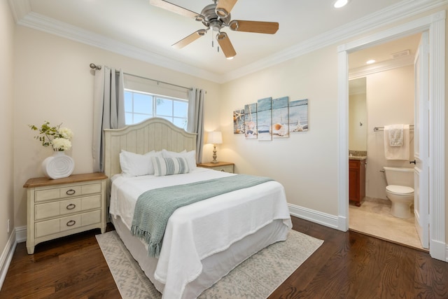 712 NE 71st St, Boca Raton, FL 33487 - bedroom with dark wood-type flooring, ensuite bathroom, baseboards, and crown molding