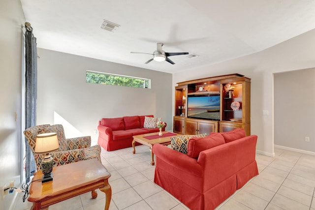2857 SE Pace Dr, Port Saint Lucie, FL 34984 - living area featuring visible vents, a ceiling fan, and light tile patterned floors