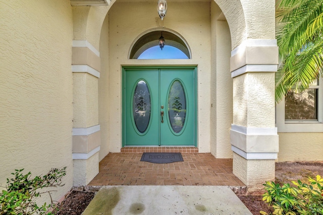 2857 SE Pace Dr, Port Saint Lucie, FL 34984 - doorway to property with stucco siding