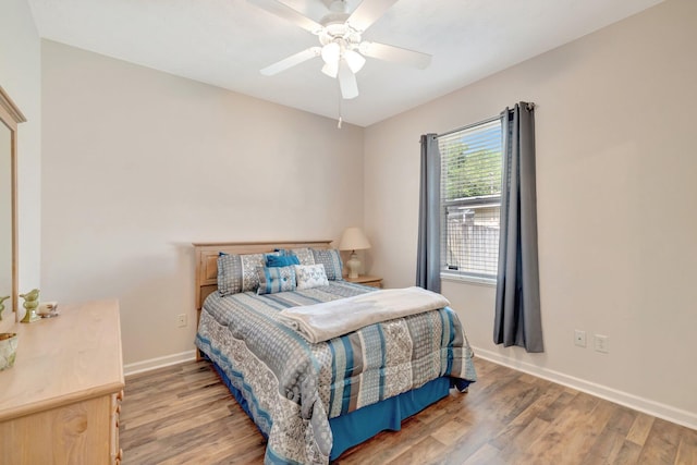2857 SE Pace Dr, Port Saint Lucie, FL 34984 - bedroom featuring light wood-type flooring, baseboards, and ceiling fan