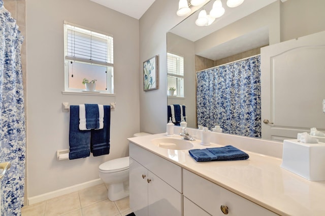 2857 SE Pace Dr, Port Saint Lucie, FL 34984 - full bath with vanity, a shower with curtain, toilet, tile patterned floors, and baseboards