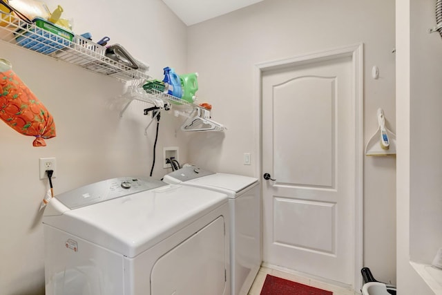 2857 SE Pace Dr, Port Saint Lucie, FL 34984 - laundry area with separate washer and dryer and laundry area