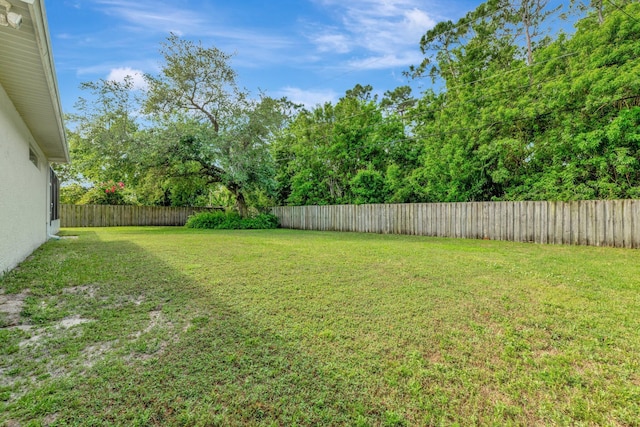 2857 SE Pace Dr, Port Saint Lucie, FL 34984 - view of yard featuring a fenced backyard