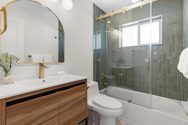 841 SE 5th Ter, Pompano Beach, FL 33060 - full bath with bath / shower combo with glass door, toilet, and vanity