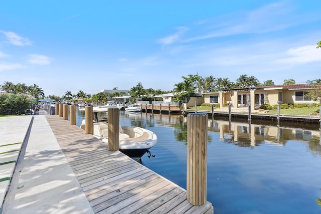 841 SE 5th Ter, Pompano Beach, FL 33060 - dock area featuring a water view