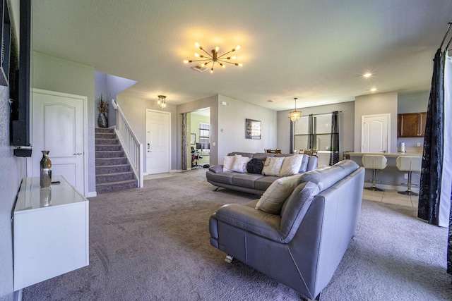 living room with stairway, a chandelier, light carpet, baseboards, and recessed lighting