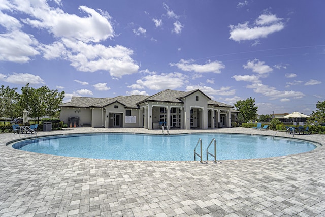 pool with a patio