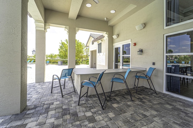 view of patio featuring outdoor dry bar